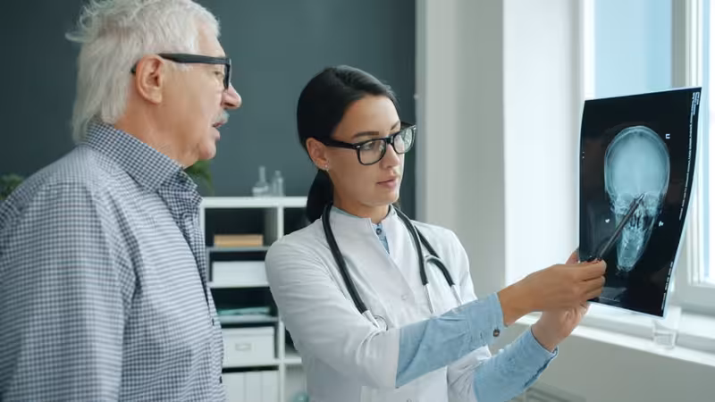 Why Audiologist-Led Ear Care Matters for Comfort and Safety: A doctor in a clinic Doctor in clinic for Why Audiologist-Led Ear Care Matters for Comfort and Safety - Information On Hearing First Kingston