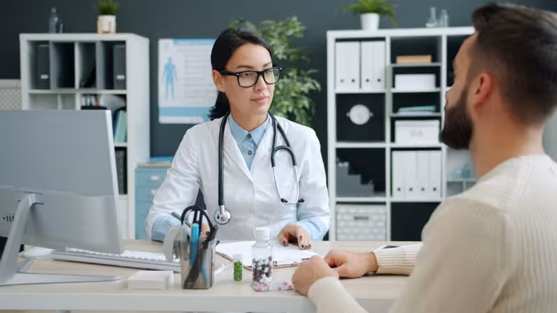 How to Reach Our Clinic: A doctor in a clinic Doctor in clinic for How to Reach Our Clinic - Hearing First Oxford Contact Number Guide